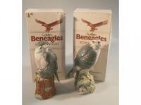 Two golden Beneagles Scotch whisky decanters in the form of a peregrine