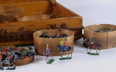 19thC Germany painted lead soldiers, by E Heinrichsen of Nurnberg, ostensibly British and India Army Foot Soldiers and Cavalry, various regiments, some with boxes or part boxes, contained in a wooden box marked for Lubeck. (a quantity) - 2