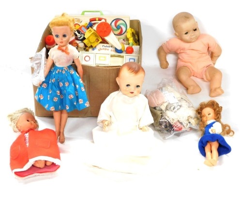 Plastic headed dolls, to include a Chiltern figure, various others, clothing, Fisher Price Toys, etc. (1 box)