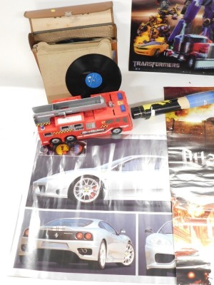 A fire truck, various aliens and other novelty posters, together with a document case. (a quantity) - 2