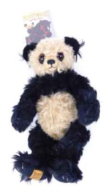 A Merrythought panda, 27cm high.