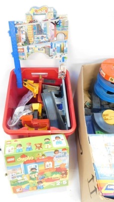 A group of Hot Wheels, Tomy and other toys and games, Tomy NCP car park, Hot Wheels track, Micro Machines Super City, etc. (2 boxes) - 2