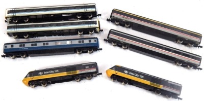 A Graham Farish N gauge Intercity 125 locomotive, with power car and non unpowered car, two coaches, an Intercity Sleeper coach, together with a Regional Railways locomotive, with power car and non power car. (7)