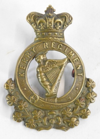 A Kerry Regiment cap badge. NB. Lots 1 to 50 in this auction are being sold with proceeds of sale being donated to Woody' Lodge Registered Charity (1173752) fund raising to continue their support to veterans.