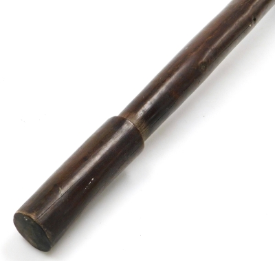 A 19thC New Caledonian Melanesia Kanak war club, of dense hardwood with a mushroom shaped phallic head, and a tapering cylindrical shaft, terminating in an expanded flange grip, 70cm wide. (AF) - 6