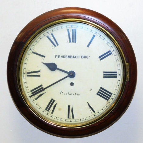 A Victorian mahogany cased wall clock by Fehrenbach Bros of Rochester, the circular dial bearing Roman numerals, with fusee movement, with pendulum, 37cm wide.
