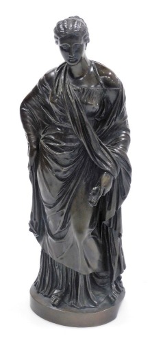 A 19thC bronze figure of a Roman Empress, or goddess, raised on a circular base, 38cm high.