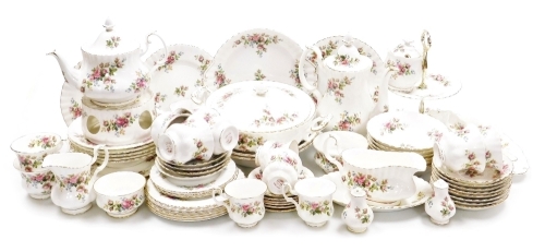 A Royal Albert Moss Rose porcelain part dinner and tea service, including a vegetable tureen and cover, dinner plates, serving bowls, coffee pot, teapot, cake stand, condiments, cups and saucers, etc. (a quantity)