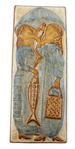 A Danish stoneware wall plaque by Marianne Starck for Michael Andersen, depicting two women under an umbrella, carrying fish and a bag, impressed marks, number 6054, 45cm x 17.5cm.