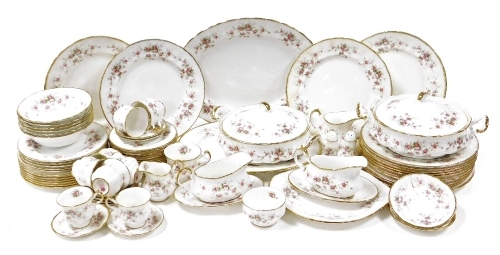 A Paragon porcelain part dinner, tea and coffee service decorated in the Victoriana Rose pattern, comprising two tureens and covers, two oval meat plates, fourteen dinner plates, six breakfast bowls, twelve side plates, fourteen cake plates, two gravy boa