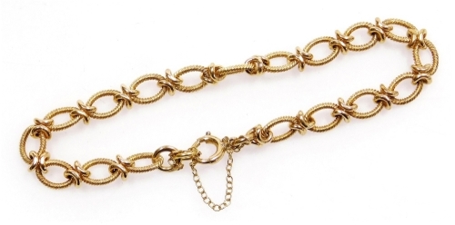 A 9ct fancy link bracelet, on a bolt ring clasp, 10.7g.