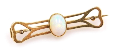 An Edwardian Art Nouveau opal brooch, set in yellow metal, stamped 15ct, 4.2g.