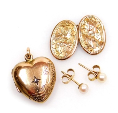 A 9ct gold diamond and heart shaped photo locket, foliate engraved, gentleman's single 9ct gold double oval and chain link cufflink, foliate engraved, and a pair of cultured pearl and gold earrings, 4.2g all in.