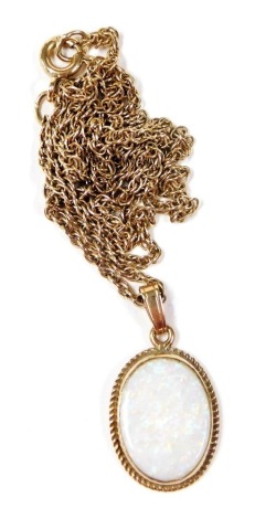 A 9ct gold and opal oval pendant, on a fancy link neck chain with bolt ring clasp, 3.7g.