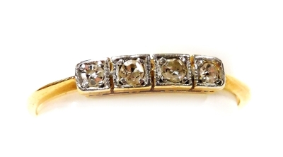 An 18ct gold and diamond four stone ring, in a rub over setting, size M, 1.3g.