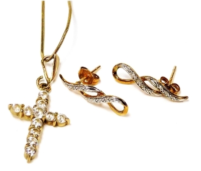 A 9ct gold and cubic zirconia set cross pendant, on a fine neck chain, and a pair of diamond set earrings, in a looped ribbon design, 4.9g.
