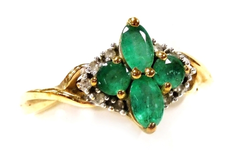 A 9ct gold emerald and diamond ring, in a four petal design, size L, 1.7g.