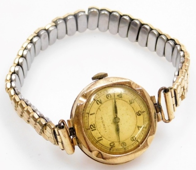 An early 20thC Federal lady's 9ct gold cased wristwatch, circular yellow dial bearing Arabic numerals, on a plated elasticated strap. - 2