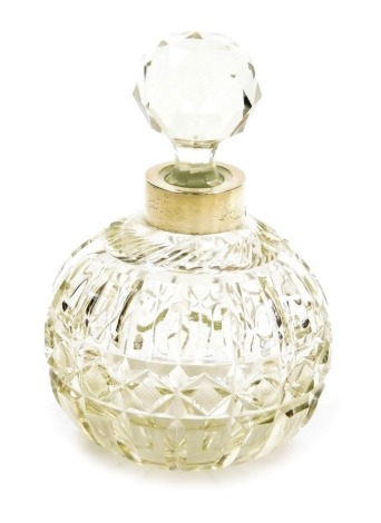 A Victorian cut glass scent bottle, with a silver collar, Thomas Hayes, Birmingham 1897, 12.5cm high.