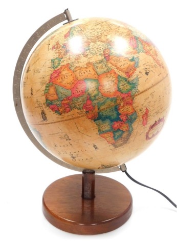 A late 20thC Danish terrestrial globe, cartography by Karl F. Harig, print by E. Giesking, on an oak base, 42cm high.