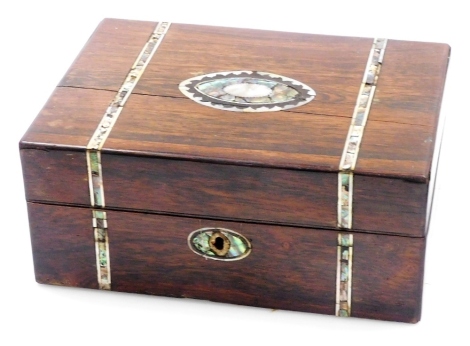 A Victorian rosewood and mother of pearl inlaid sewing box, the hinged lid enclosing a fitted interior containing various accoutrements, with key, 12cm high, 28cm wide, 19cm deep.