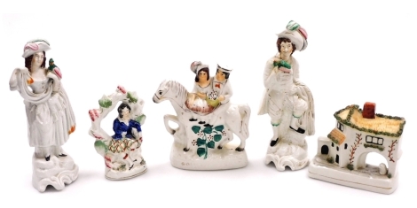 A group of 19thC Staffordshire style pottery figures, to include a lady and gentleman on horseback, 22cm high, cottage, 17cm high, etc.