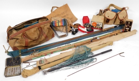 A group of fishing tackle, to include a Milbro split cane fishing rod, a Knebworth split cane fishing rod, net, a Mitchell 306 reel, fly line, canvas bag, etc. (a quantity)