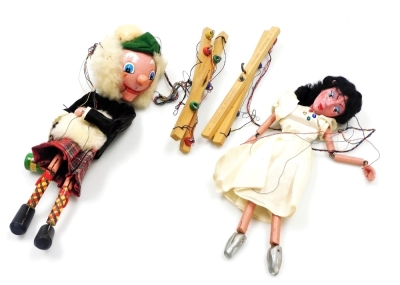 Two Pelham Puppets, comprising a ballet dancer, and Sam, each boxed.