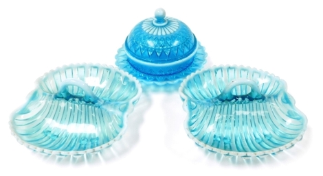 An early 20thC blue opaline glass butter dish and cover, of globular form, with a protruding wave shaped band, 14cm high, 18cm diameter, together with two similar twin division dishes, each 20cm wide.