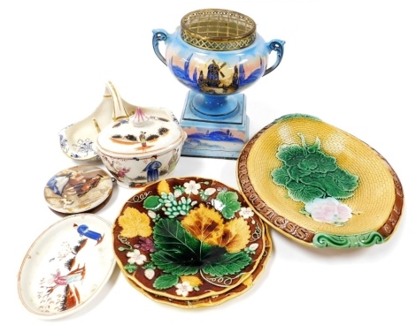 A group of ceramics, to include an early 19thC pottery sugar bowl and cover, possibly New Hall, of oval form depicting figures in an Oriental landscape, 15cm high, together with an oval plate, 20cm diameter, a majolica bread dish, two majolica plates, dec