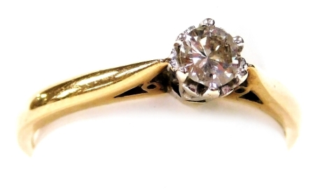 A 9ct gold and diamond solitaire ring, high claw set, approximately 0.25 carat, size R, 2.6g.