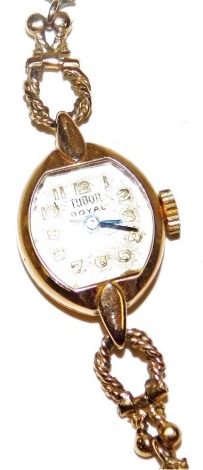 A mid century Tudor Royal lady's 9ct gold oval cased wristwatch, the silver oblong dial bearing Arabic numerals, on a fancy link bracelet strap, 12.6g all in.