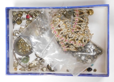 A group of early 20thC costume jewellery, including paste set buckles, hair slides, brooches, together with buttons, costume trimmings, silver charms, etc. (2 boxes) - 3