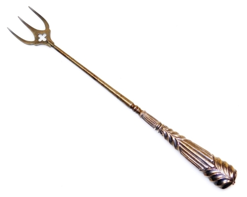 A Victorian silver handled toasting fork, with fluted decoration, Birmingham 1889, 29cm wide.