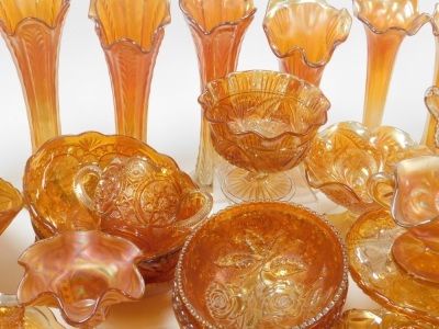 A large group of carnival amber glassware, including vases, bowls, sweetmeat dishes, and sundries. (a quantity) - 4