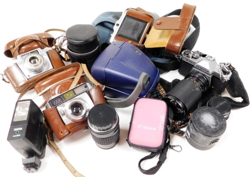 A group of camera and other related equipment, to include a Balda camera, in leather case, Agfa camera in leather case, a Pentax - M1.3.5 135mm lens, a Pentax K1000 camera, with 1:4-5.5 f=28-135mn lens, 86102334, other lenses, etc. (a quantity)