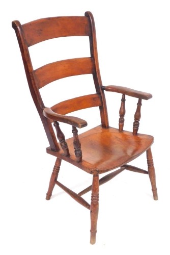 A Victorian beech ladder back kitchen chair, with a solid saddle seat, raised on ring turned legs, united by an H frame stretcher, 57cm wide.