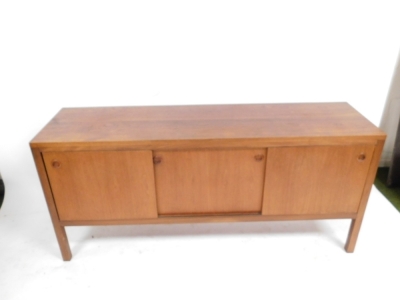 A 1960's Younger Limited teak sideboard, the base with three sliding doors, on square legs, 77cm high, 165cm wide, 45.5cm deep. - 2