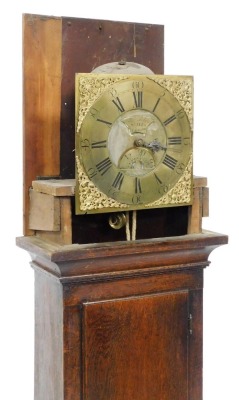 A Georgian oak cased long case clock, by J N Stokes of St Ives, number 667, the brass dial bearing Roman and Arabic numerals, subsidiary seconds dial, with cherub and scroll spandrels, chain driven, the case with scroll carving to the top, on a plinth bas - 3