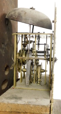 A Georgian oak cased long case clock, by J N Stokes of St Ives, number 667, the brass dial bearing Roman and Arabic numerals, subsidiary seconds dial, with cherub and scroll spandrels, chain driven, the case with scroll carving to the top, on a plinth bas - 4