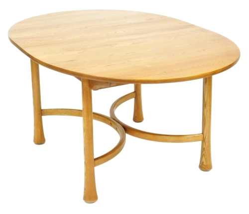 An Ercol elm draw leaf dining table, the oval top raised on turned outswept legs, united by an x framed stretcher, Saville range model number 26, 74cm high, 162cm wide, 212cm extended, 108cm deep.,