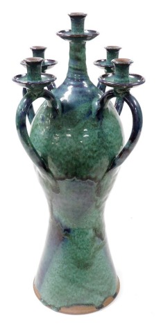 A Kayser green glazed pottery five branch candle stand, of bulbous form with a tapered base, signed and dated 1998, 62cm high.