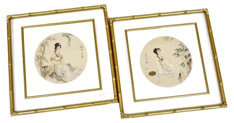 A pair of Chinese paintings on silk, depicting young women in a landscape setting, signed, 30cm x 30cm, in gilt frames.