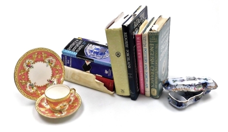 A 19thC Ridgway toothbrush box and cover, floral decorated, Cauldon porcelain trio, decorated with flowers against a pink ground, gilt heightened, reference books on Ridgway porcelain, ceramics and general, plate and cup stands etc. (a quantity)