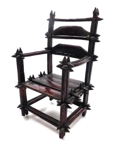 A late 19thC Continental stained wooden apprentice chair, 31cm high, 19cm wide.