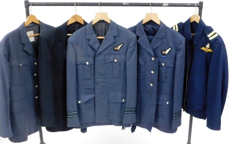 RAF Squadron Leader's uniforms, including a jacket and trousers, three further jackets, and a light coat.