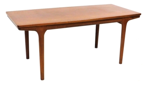 An A.H. MacIntosh and Company Limited teak coffee table, with a rectangular top, raised on turned legs, 46cm high, 106.5cm wide, 48cm deep.