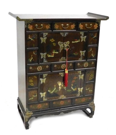 A Chinese elm and lacquered cabinet, with an arrangement of three drawers over two pairs of cupboard doors, all decorated with birds and flowers, raised on bracket feet, 86cm high, 70cm wide, 33cm deep.