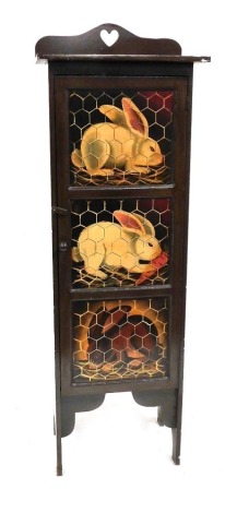 A painted wooden side cabinet, painted to the front in imitation of a rabbit hutch, raised on straight legs, 155cm high, 51cm wide, 35cm deep.