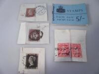 A Penny Black postage stamp attached to a section of paper